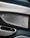 Close-up of the Sonus faber automotive speaker system in a Maserati, highlighting intricate details of the car.